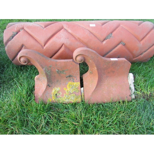 5302 - A pair of scrolled ridge tiles