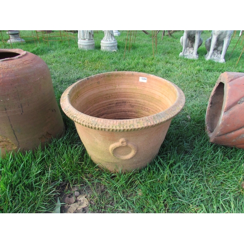 5304 - A round terracotta planter, loop handle, 19