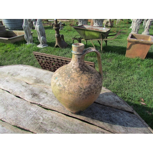 5332 - A small terracotta ewer, 14