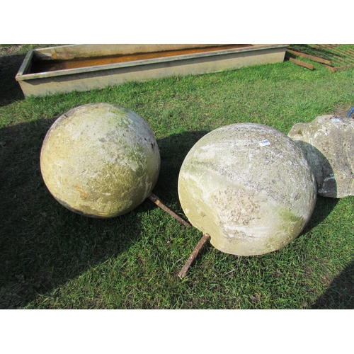 5368 - A large pair of weathered stone ball pier cap finials, approx 20