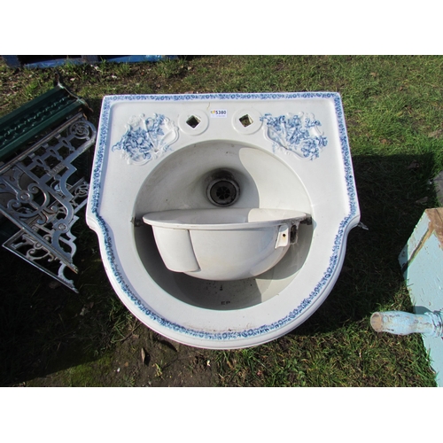 5380 - A round front blue and white pattern basin