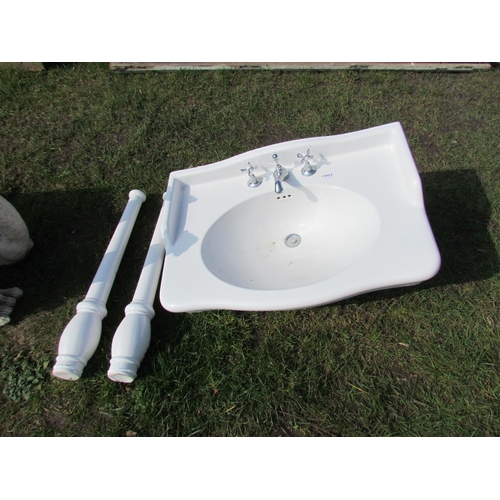 5412 - A Heritage shaped front basin on ceramic front supports