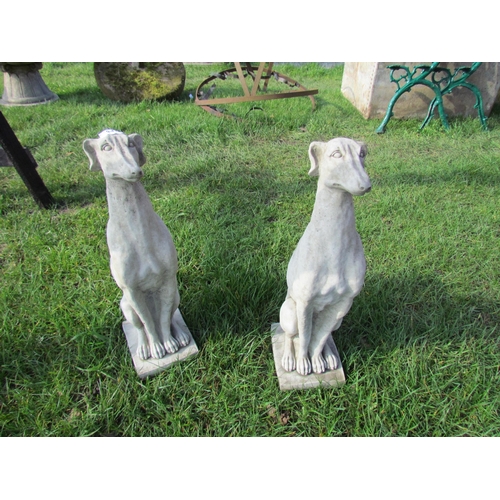 5418 - A pair of seated composition dogs, 21