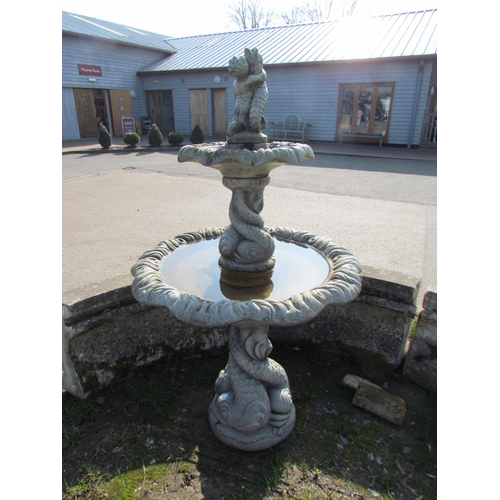 5444 - A Henri Studio two tier garden fountain, the top outlet of cherub and fish, each bowl standing on my... 