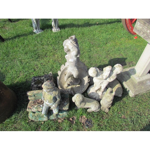 5462 - A selection of composition garden ornaments  (R)  £0