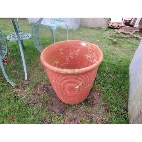 5067 - A large terracotta ribbed pot, 18