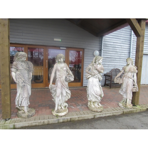 5487 - A set of four weathered reconstituted statues of The Four Seasons, approx 58