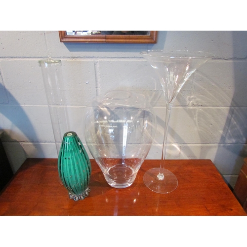 1081 - A clear glass vase of bulbous form, 46cm tall, a clear glass lidded pasta jar, 59cm tall, an oversiz... 