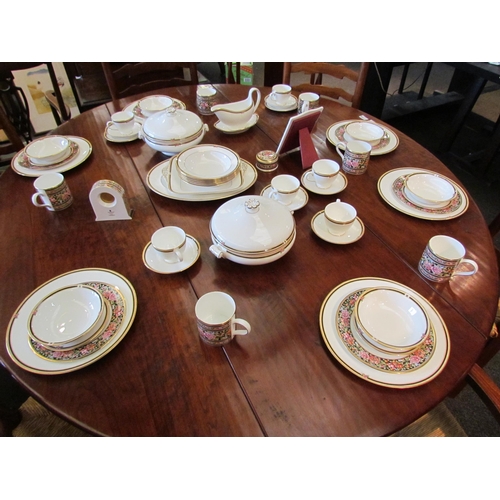 1107 - A quantity of Wedgwood 'Clio' pattern dinner and tea ware, photograph frame, clock etc.