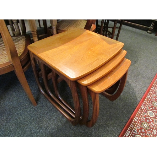 1117 - A Nathan 'Burlington' teak nest of three coffee tables, largest 50cm tall x 52cm wide x 44cm deep