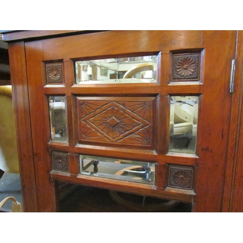 1126 - An Edwardian music cabinet, mirrored panels, on castors, 94cm tall x 53cm wide x 37cm deep