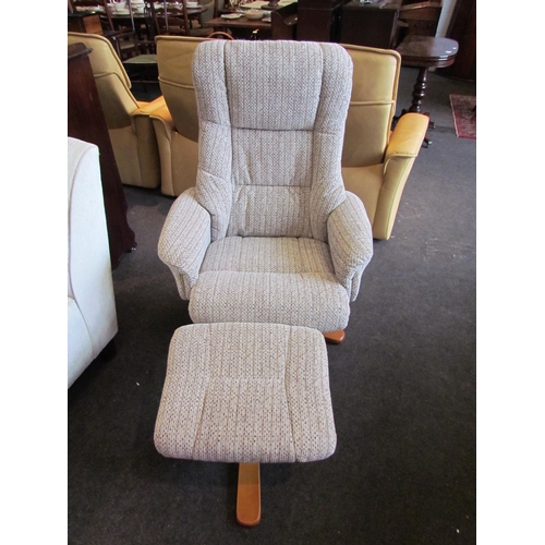 1135 - A modern recliner chair, beech base with matching stool