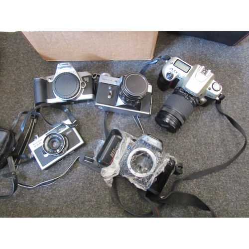 1147 - Two boxes of 35mm cameras and lenses including Nikon, Zenit-e etc