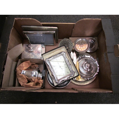 1165 - A box of plated wares to include sardine dish, salver, clock, picture frames, etc