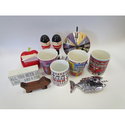 1180 - An AMS metal clock on stand, ceramic Beefeater egg cups with salt and pepper bearskin, London mugs, ... 