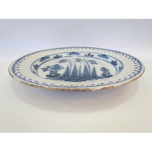 1192 - A Circa 1760 English Delft ware charger, 37cm diameter, some restoration