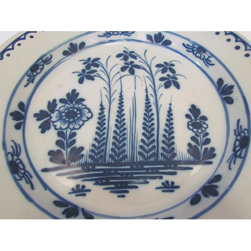 1192 - A Circa 1760 English Delft ware charger, 37cm diameter, some restoration