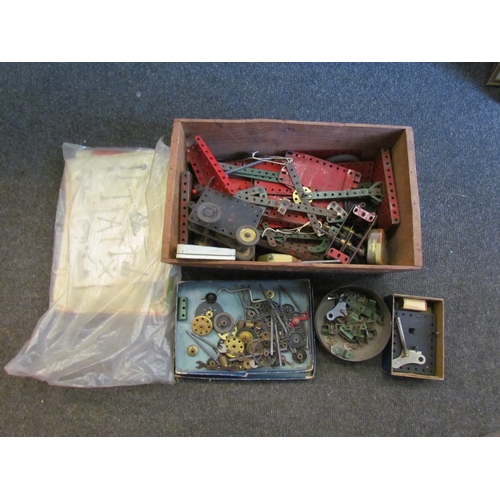 1200 - A wooden crate of vintage Meccano, some boxed, some instructions