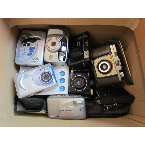 1202 - A box of various cameras including Kodak and Nikon together with a Sony Walkman