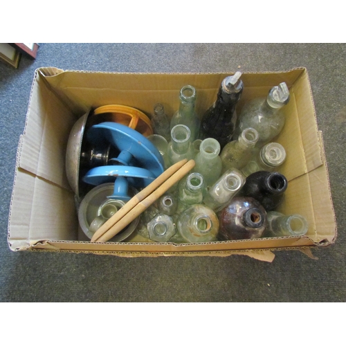 1212 - A selection of bygone glass bottles and chamber sticks including ceramic, plated and enamelled examp... 