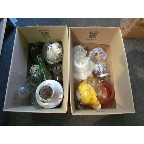 1223 - Two boxes of oil lamps, shades and funnels to include a pair of flared vaseline shades