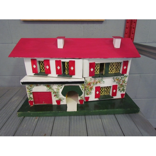 1230 - A two storey dolls house, 35cm tall x 60cm long