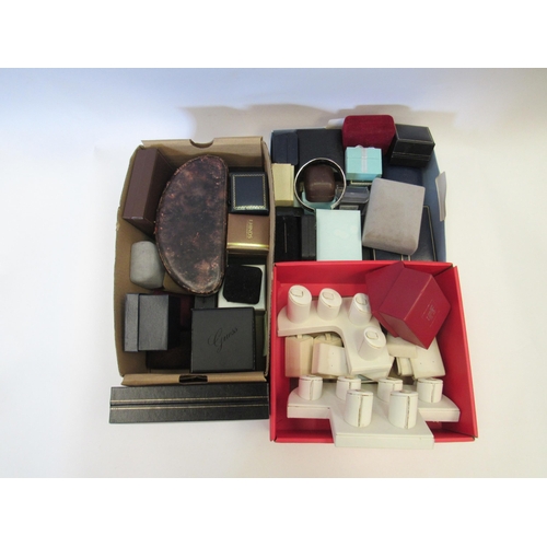 1295 - Three boxes containing empty jewellery boxes and stands and a white metal bottle stopper