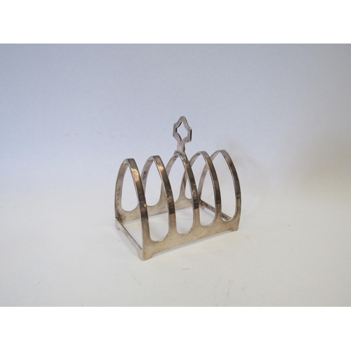 1297 - A silver four slice toast rack.  Sheffield 1964.  Viner's Ltd.  Approximately 50g