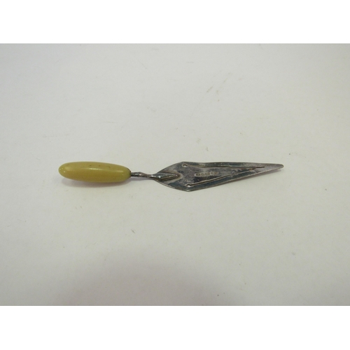 1307 - A Charles Horner silver trowel form bookmark with celluloid handle.  Chester 1922