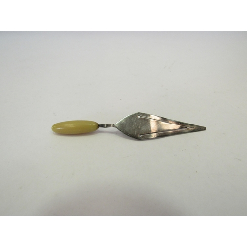 1307 - A Charles Horner silver trowel form bookmark with celluloid handle.  Chester 1922