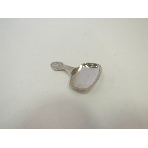 1308 - A silver caddy spoon.  Sheffield 1919.  Cooper Brothers Ltd