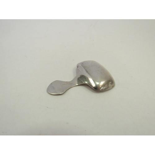 1308 - A silver caddy spoon.  Sheffield 1919.  Cooper Brothers Ltd