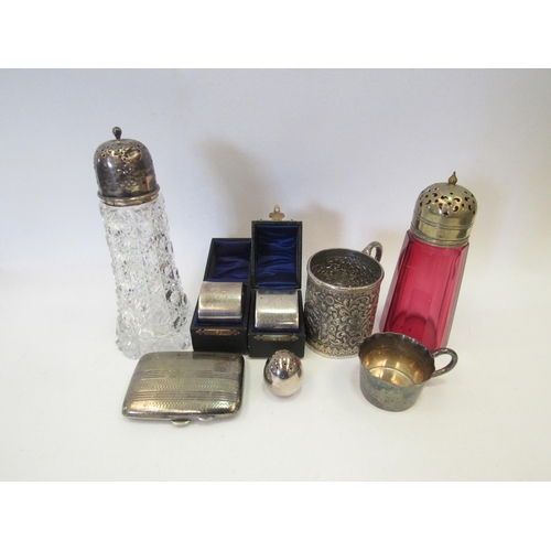 1311 - Two silver napkin holders (boxed), a silver topped cut glass sugar sifter, EPNS cigarette case, etc