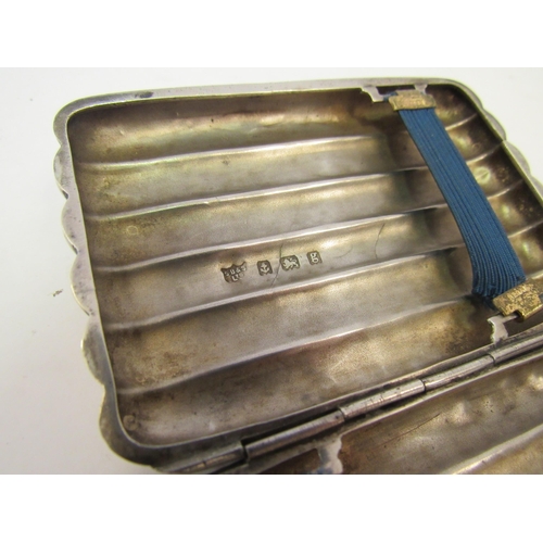 1335 - A small silver cigar case