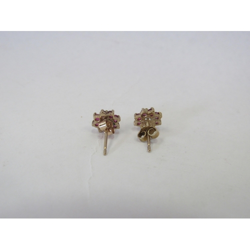 1343 - A pair of 9ct gold, opal and ruby set floral design earrings