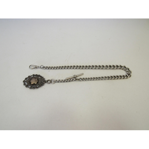 1345 - A heavy graduated link silver watch chain with T-bar and dog clip with silver fob attached.  Approxi... 