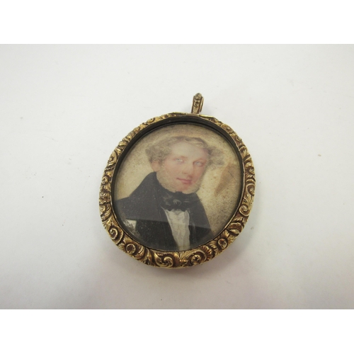 1346 - An early to mid 19th Century watercolour miniature on an oval ivory panel depicting the portrait of ... 