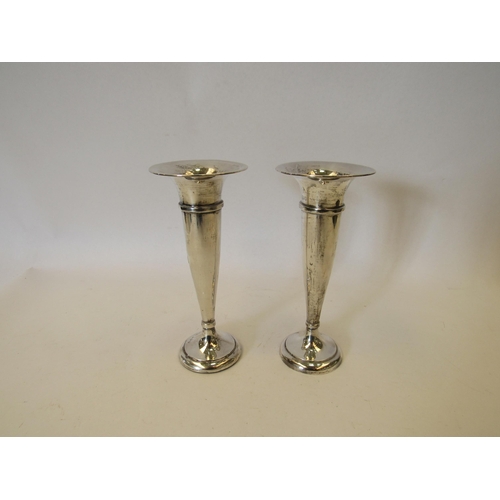 1376 - A pair of silver vases.  Birmingham 1915.  Sydney & Co. approximately 15.5cm tall