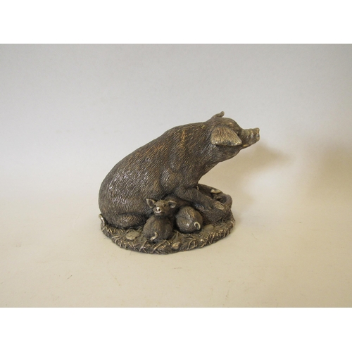 1378 - A sterling silver figural sculpture of a pig with piglets, 7cm high