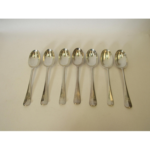 1381 - Seven silver crested dessert spoons