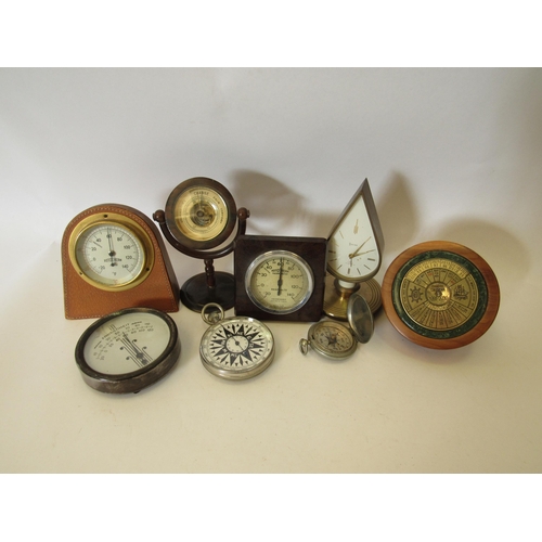 1383 - A naval themed desk top calendar, thermometers,  barometers, two compasses etc