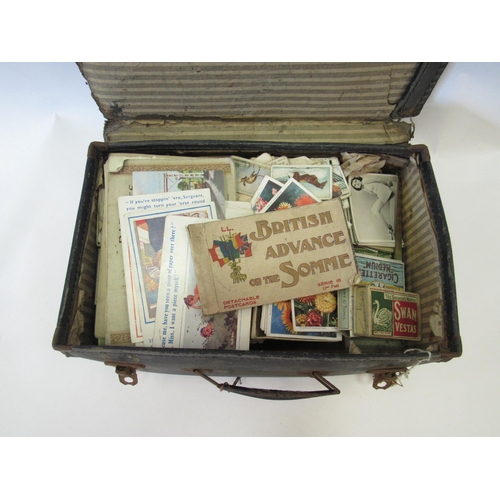 1251 - A suitcase containing cigarette cards, postcards etc to include a booklet 