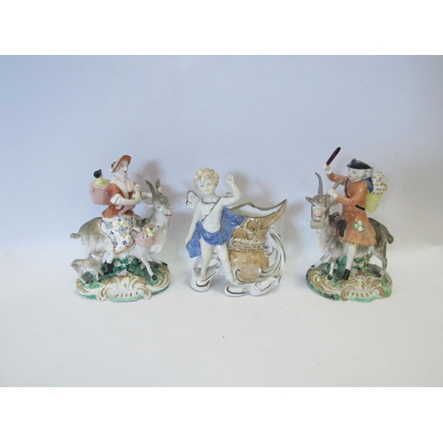 1259 - A pair of ceramic figures, Welsh tailor and his wife both riding goats together with a figure of che... 