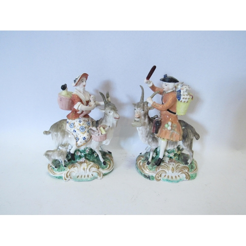 1259 - A pair of ceramic figures, Welsh tailor and his wife both riding goats together with a figure of che... 