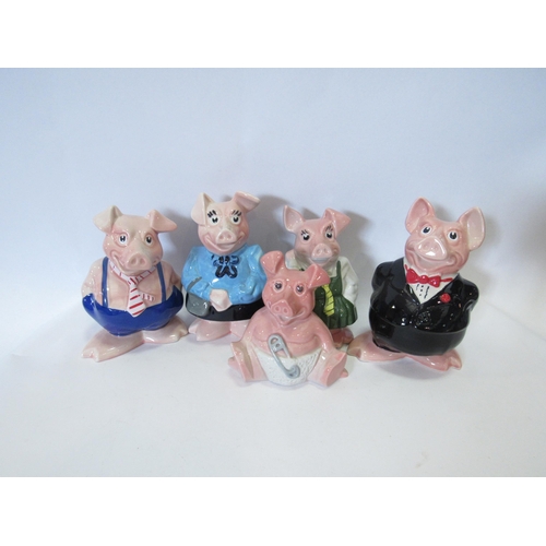 1264 - A set of five Nat West pigs with documentation together with a collection of Royal Doulton Bunnykins... 