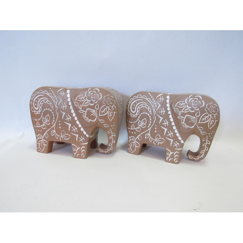 1272 - A pair of terracotta elephant book ends, 16cm tall