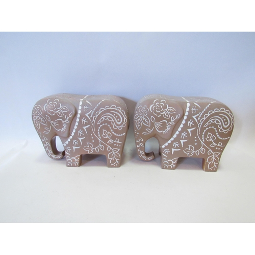 1272 - A pair of terracotta elephant book ends, 16cm tall