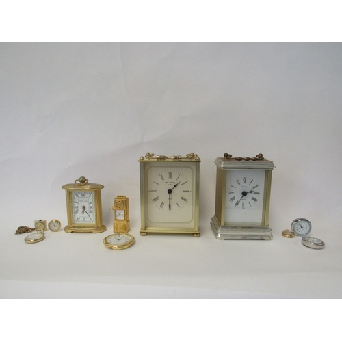 1393 - A box containing two carriage style clocks, weights, Tissot box and container of watch buckles