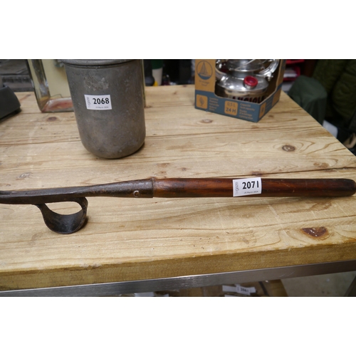 2071 - A cast iron dandelion lifter, stamped Brades, wooden handle   (R) £25