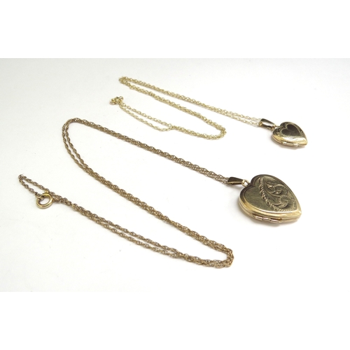 7092 - Two 9ct gold heart shaped lockets hung on chains one marked 9k, 6g total